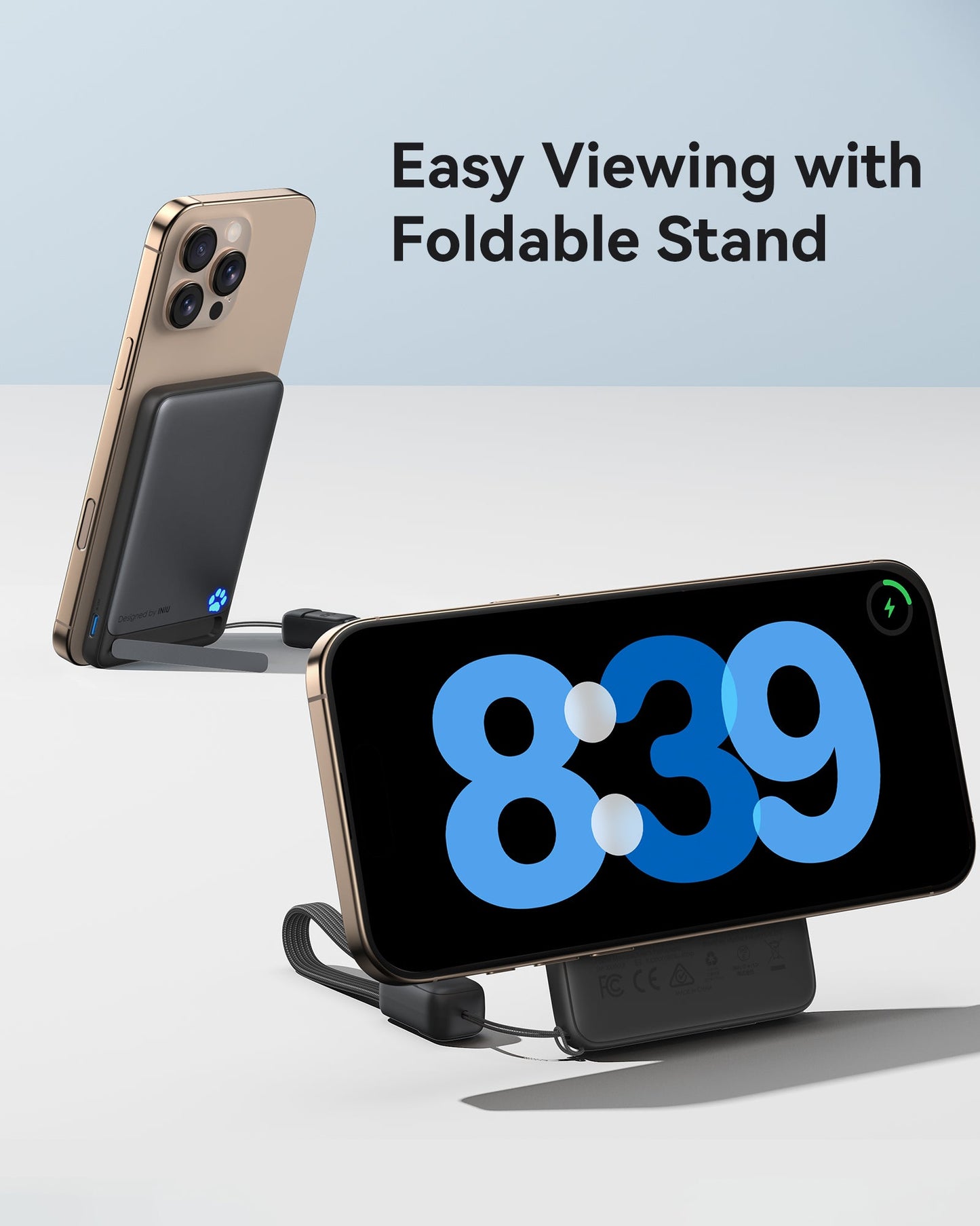 INIU SnapGo P71-E1: iPhone 16 Pro charging on black power bank with foldable stand for easy viewing.