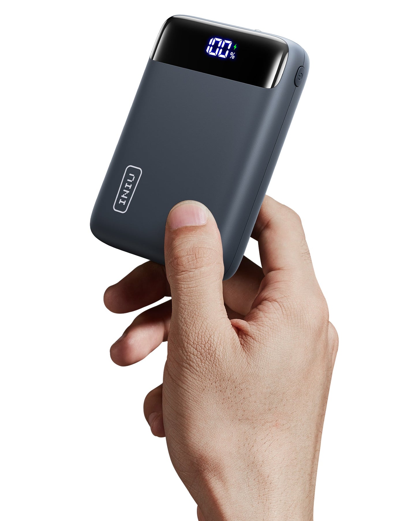 INIU Carry P51-E2 Power Bank in hand, showing 100% charge, dark gray, pocket-sized, fast charging