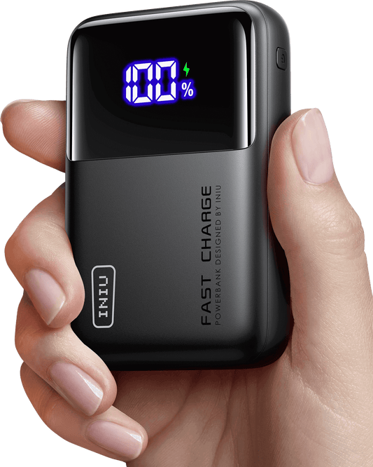 INIU Cougar P63-E1 Power Bank in hand. Shows 100% charge on display. Features Fast Charge technology and compact design.