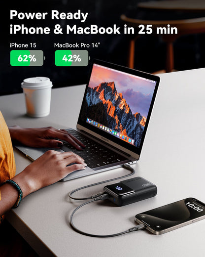 INIU P63-E1 Power Bank charging iPhone 15 and MacBook Pro 14 simultaneously, fast charging in 25 minutes, black power bank.