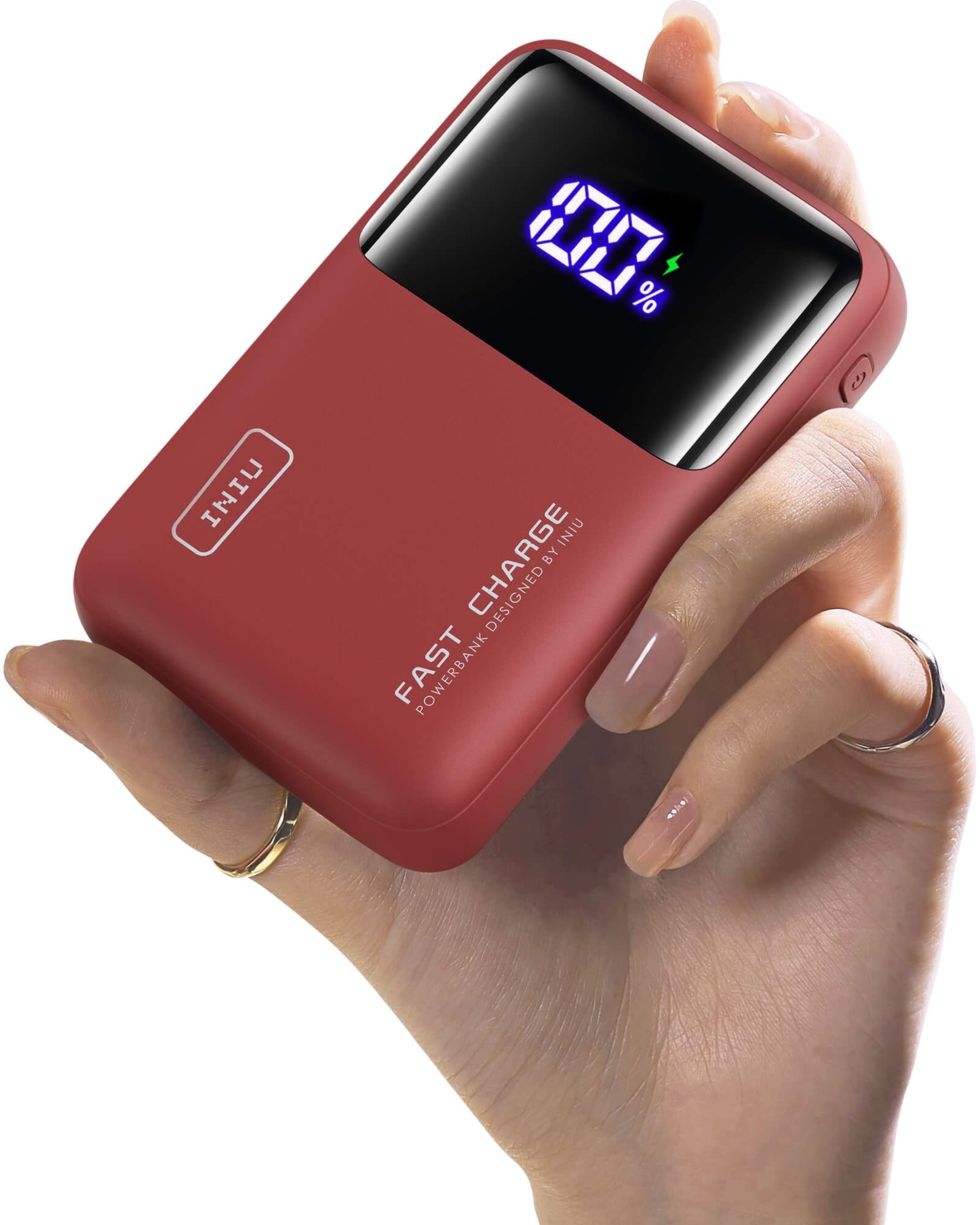 INIU Cougar P62-E1 Power Bank: Red power bank held in hand, showing 100% charge, fast charging.
